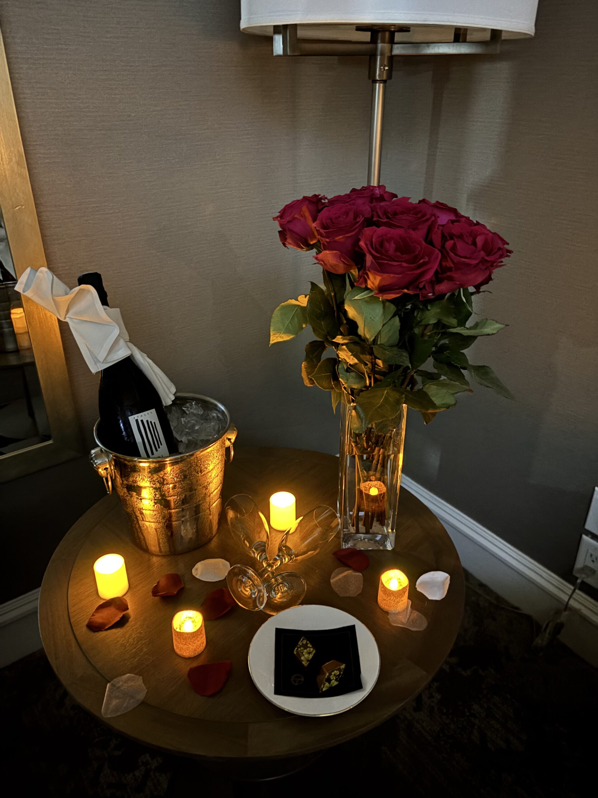 Couple watching sunset over mountains
